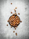 The hazelnuts in an old pan. Royalty Free Stock Photo
