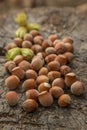 Hazelnuts on a wooden background Royalty Free Stock Photo