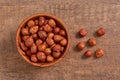 Hazelnuts seeds on wooden background