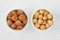 Hazelnuts with and without shell in bowl