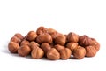 Hazelnuts without shell on a white background, isolated. Pile of hazelnut closeup