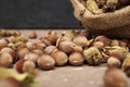 hazelnuts spilled on the table from a canvas bag close-up