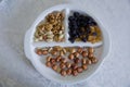 Hazelnuts, walnuts, black cheese, white raisins, nuts