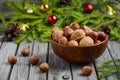 Hazelnuts and walnuts in a wooden bowl Royalty Free Stock Photo