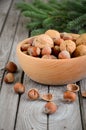 Hazelnuts and walnuts in a wooden bowl Royalty Free Stock Photo
