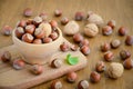 Hazelnuts and walnuts in a wooden bowl Royalty Free Stock Photo