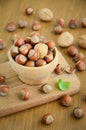 Hazelnuts and walnuts in a wooden bowl Royalty Free Stock Photo