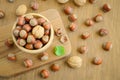 Hazelnuts and walnuts in a wooden bowl Royalty Free Stock Photo