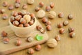 Hazelnuts and walnuts in a wooden bowl Royalty Free Stock Photo