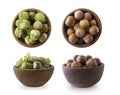 Hazelnuts in a wooden bowl isolated on white background, top view. Shelled hazelnuts in a bowls. Royalty Free Stock Photo
