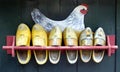 Rack of wooden clogs at a farm Royalty Free Stock Photo