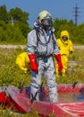 Hazmat team members have been wearing protective suits