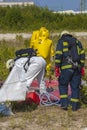 Hazmat team members have been wearing protective suits to protect them from hazardous materials