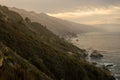 Hazy Cliffs Drop Into The Pacific Ocean Along The California Coast