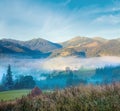 Hazy daybreak in mountain valley