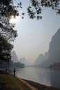 A hazy scene along the Li River between Guilin and Yangshuo in Guangxi Province, China