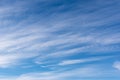 Hazy small cirrostratus, cirrocumulus and cumulus cloud formations at blue sky