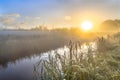 Hazy sunrise over River in dutch countriside Royalty Free Stock Photo