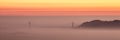 Hazy sunset over Golden Gate Bridge, San Francisco. Royalty Free Stock Photo