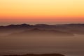 Hazy sunset over Angel Island and the Marin Hills of the Golden-Gate National Recreation Area. Royalty Free Stock Photo