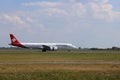 HB-AZI Helvetic Airways Embraer E195-E2 landing on the Polderbaan of Amsterdam Schiphol Airport