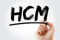 HCM - Human Capital Management acronym with marker, business concept background