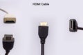 HDMI cable from different angles isolated against white background. HDMI cable for monitor and TV audio video connection Royalty Free Stock Photo