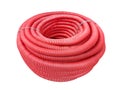 HDPE corrugated pipe isolated on white background. Protection underground cable. Rolled up red corrugated PVC pipe. Red building Royalty Free Stock Photo