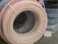 HDPE pvc pipe rolls at diy hardware store warehouse depot Royalty Free Stock Photo