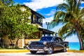 HDR - American black vintage car parked in the front view before the beach in Varadero Cuba - Serie Cuba Reportage Royalty Free Stock Photo