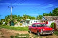 HDR - American red Dodge classic car parked on the side street in the province Matanzas in Cuba - Serie Cuba Reportage Royalty Free Stock Photo