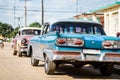 HDR Cuba american blue vintage car parked on the road Royalty Free Stock Photo