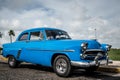 HDR Cuba blue american classic car parked Royalty Free Stock Photo