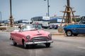 HDR Cuba pink american classic car drives on the Malecon in Havana Royalty Free Stock Photo