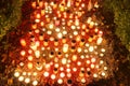 HDR long exposure night image of decorations and candles burning on grave in a cemetery during the All Saints Day in CZ Royalty Free Stock Photo