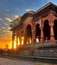 HDR of a palace with the rising sun behind it