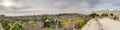 HDR panorama View on the old historic Mdina walls at Malta with surrounding nature and dynamic skies at sunset time Royalty Free Stock Photo