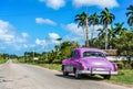 HDR - Parked american green Chevrolet classic car at the side street on the Highway to Havana Cuba - Serie Cuba Reportage. Royalty Free Stock Photo