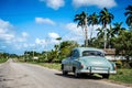 HDR - Parked american green Chevrolet classic car at the side street on the Highway to Havana Cuba - Serie Cuba Reportage Royalty Free Stock Photo