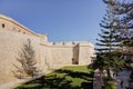 HDR photo of Mdina city historic walls on a sunny summer day. Mdina is the former historic capital of the Malta island