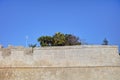 HDR photo of Mdina city historic walls on a sunny summer day. Mdina is the former historic capital of the Malta island