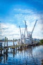 HDR photo of shrimp boats on a dock.