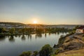 HDR photo of a view on Vltava river with sun setting behind it from Vysehrad in Prague, Czech republic