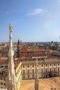 HDR photo of the white marble statues of Cathedral Duomo di Milano on piazza, Milan cityscape and the Royal Palace of Milan Royalty Free Stock Photo