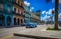 HDR - Street life scene in Havana Cuba with blue american vintage cars - Serie Cuba Reportage