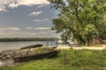 HDR Wooden fishing boat on the Danube river shore Royalty Free Stock Photo