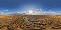 hdri 360 panorama on gravel road among fields in evening before sunset in equirectangular full seamless spherical projection, for Royalty Free Stock Photo
