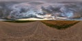hdri 360 panorama on gravel road among fields in nasty evening before sunset with dark clouds in equirectangular full seamless Royalty Free Stock Photo