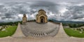 360 hdri panorama near yellow brick orthodox georgian church high in mountains in cloudy day in equirectangular spherical