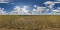 360 hdri panorama view among fields in spring day with beautiful clouds in equirectangular full seamless spherical projection,